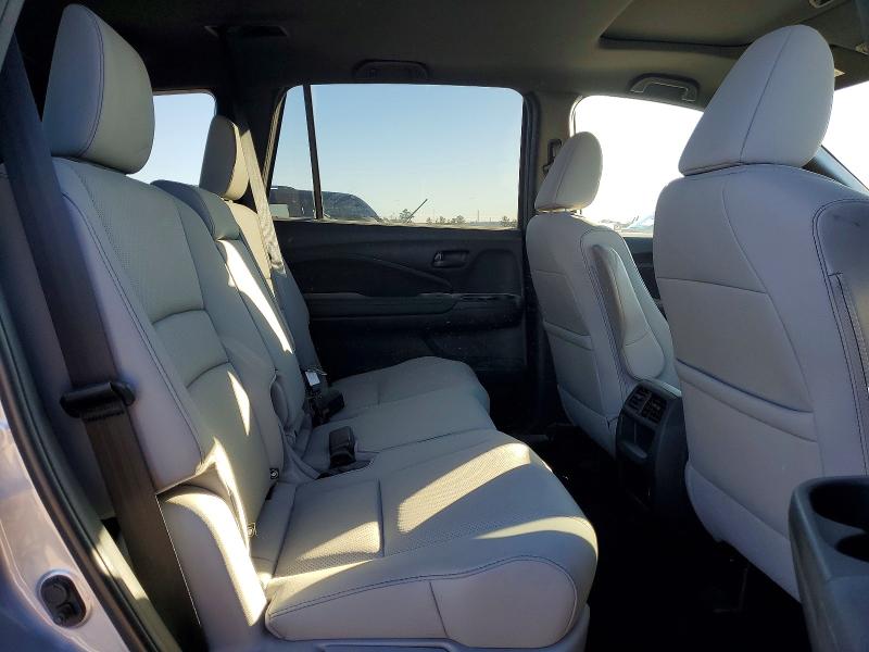 Photo 11 from auction – 2023 HONDA PASSPORT E with VIN 5FNYF8H58PB012814