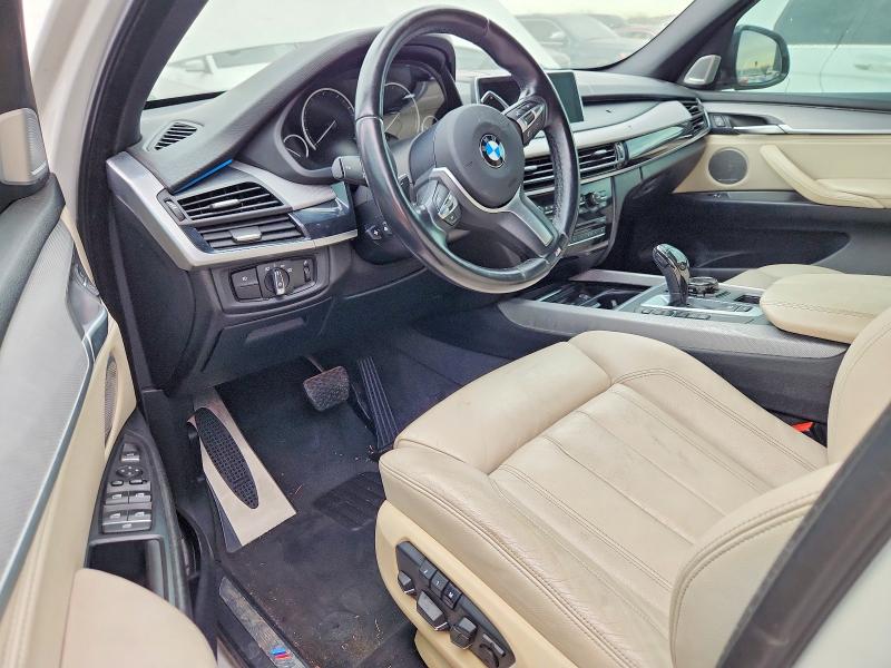 Photo 8 from auction – 2014 BMW X5 XDRIVE5 with VIN 5UXKR6C59E0J73188