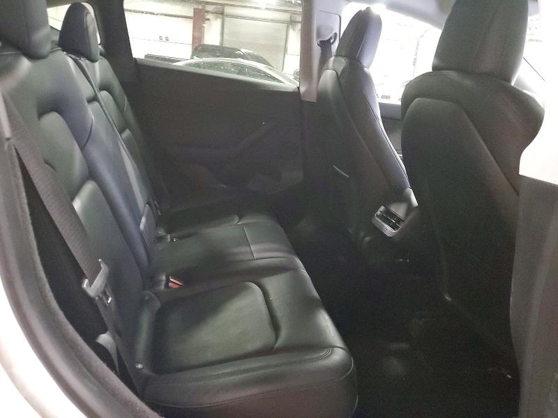 Photo 11 from auction – 2023 TESLA MODEL Y with VIN 7SAYGDEE8PF676835
