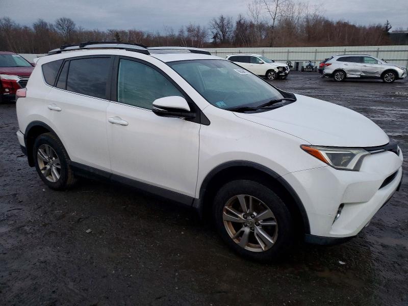 Photo 4 from auction – 2016 TOYOTA RAV4 XLE with VIN 2T3RFREV4GW510811
