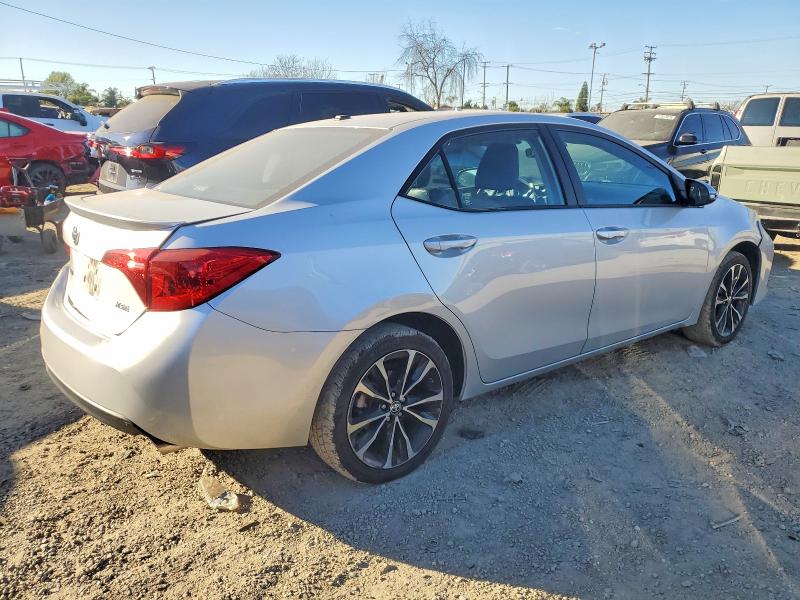 Photo 3 from auction – 2018 TOYOTA COROLLA L with VIN 2T1BURHE7JC053397