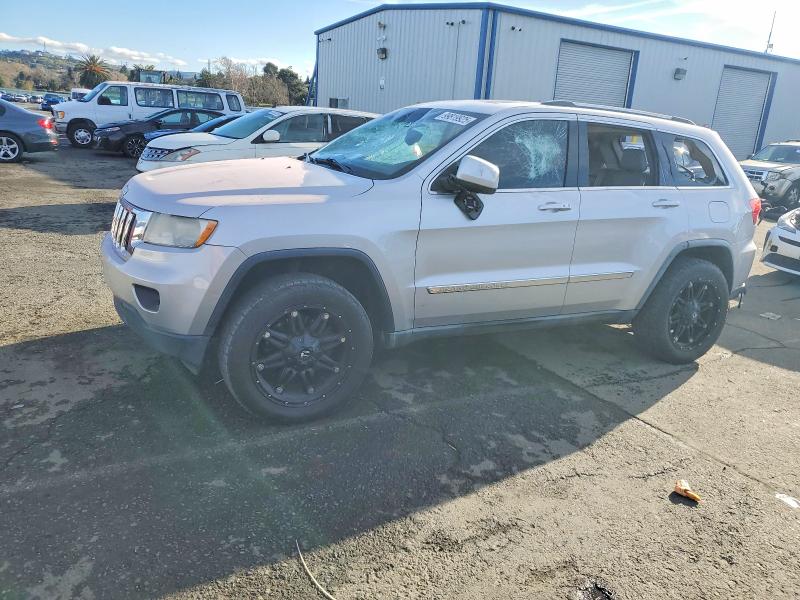 JEEP GRAND CHER 2011 with VIN 1J4RR4GG1BC642701 - Photo from auction