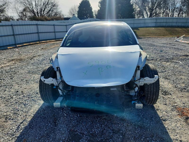 Photo 5 from auction – 2021 TESLA MODEL 3 with VIN 5YJ3E1EA7MF046132