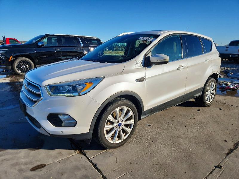 FORD ESCAPE TIT 2017 with VIN 1FMCU0J98HUB88586 - Photo from auction