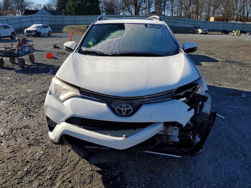 Photo 5 from auction – 2017 TOYOTA RAV4 XLE with VIN JTMWFREV7HJ115167