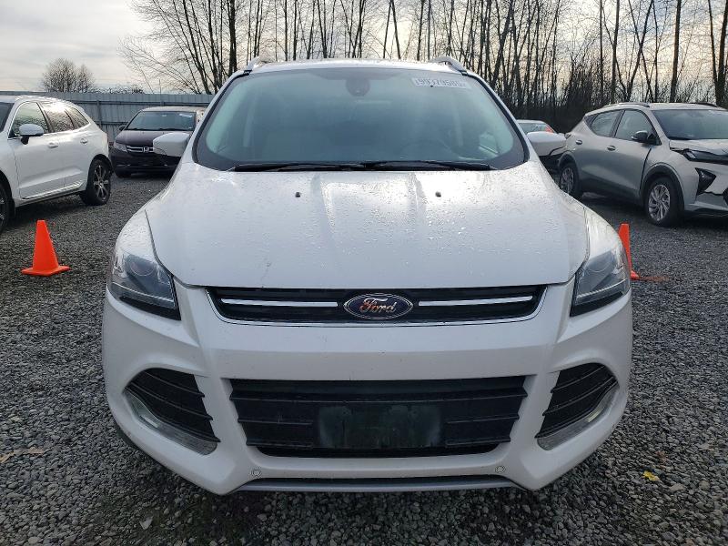 Photo 5 from auction – 2014 FORD ESCAPE TIT with VIN 1FMCU9J99EUD93334