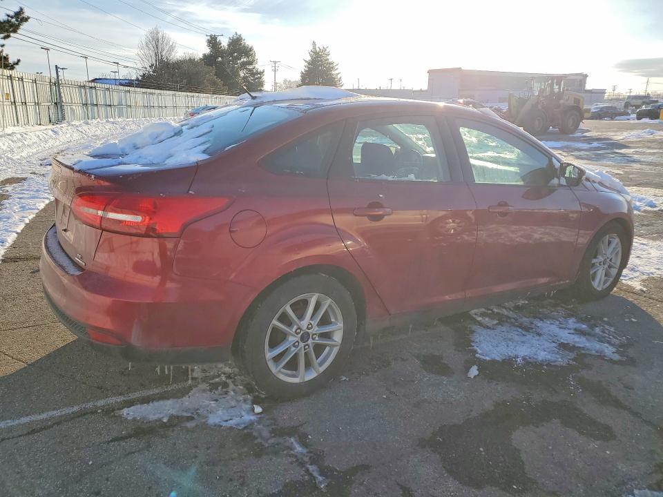 Photo 3 from auction – 2016 FORD FOCUS SE with VIN 1FADP3F21GL213786