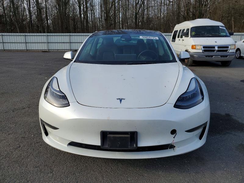 Photo 5 from auction – 2022 TESLA MODEL 3 with VIN 5YJ3E1EAXNF326953