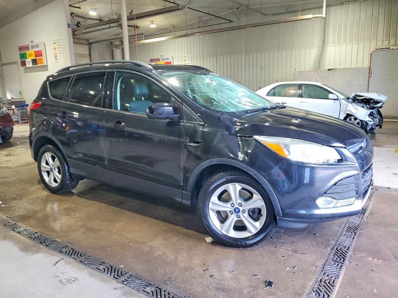 Photo 4 from auction – 2014 FORD ESCAPE with VIN 1FMCU9G90EUA96606