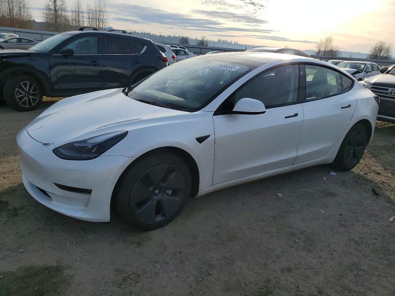 TESLA MODEL 3 2022 with VIN 5YJ3E1EB8NF210241 - Photo from auction
