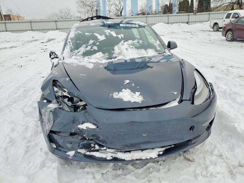 Photo 5 from auction – 2022 TESLA MODEL 3 with VIN 5YJ3E1EB1NF311105