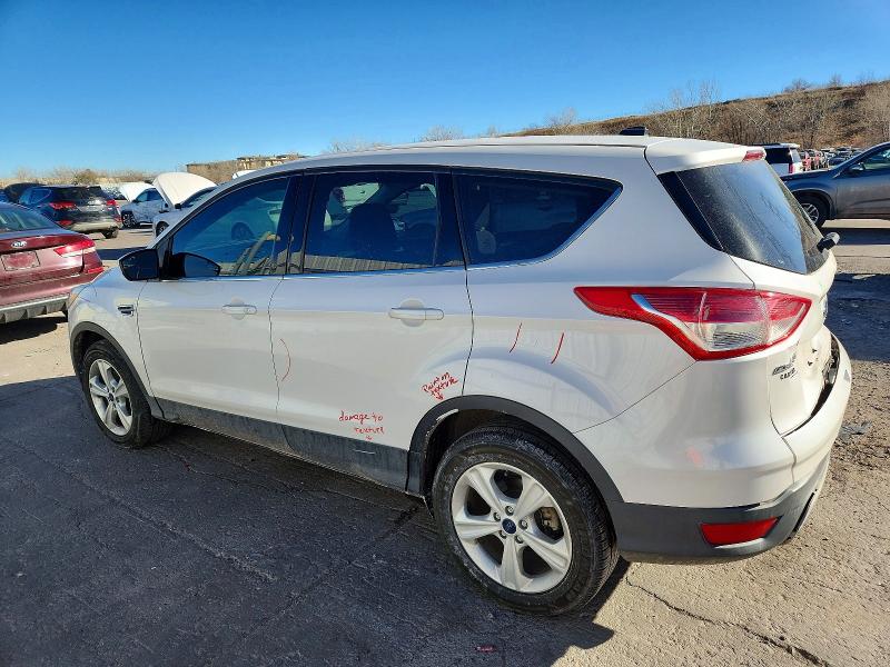 Photo 2 from auction – 2016 FORD ESCAPE with VIN 1FMCU9GX4GUB59529
