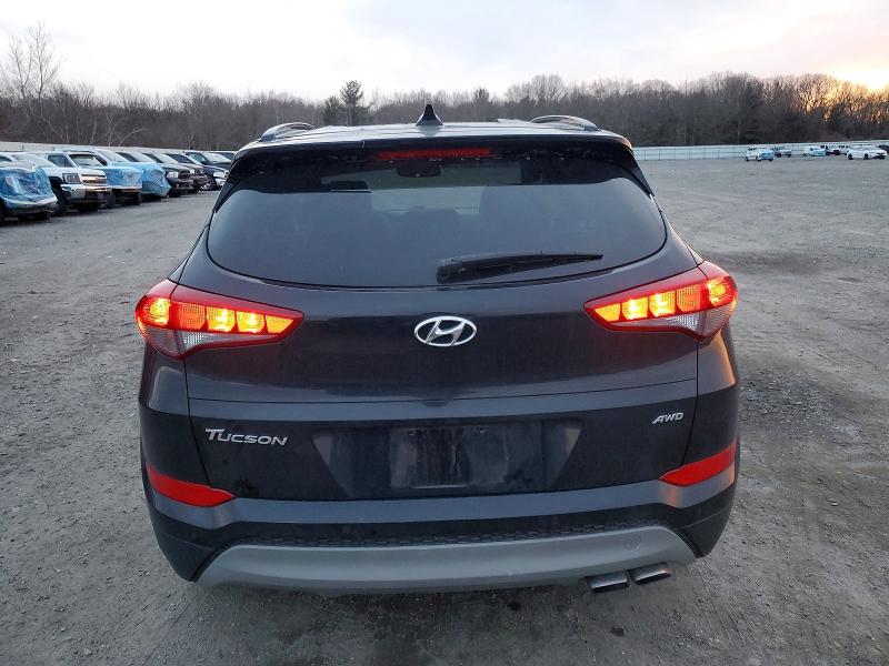 Photo 6 from auction – 2018 HYUNDAI TUCSON VAL with VIN KM8J3CA29JU724675