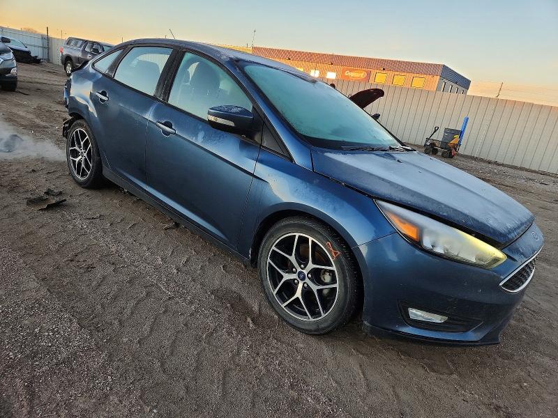 Photo 4 from auction – 2018 FORD FOCUS with VIN 1FADP3H23JL293001