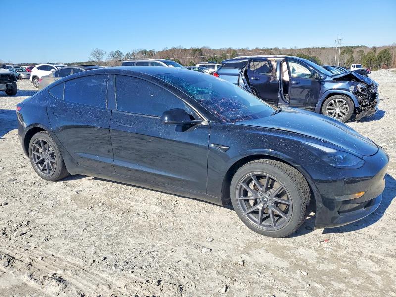 Photo 4 from auction – 2021 TESLA MODEL 3 with VIN 5YJ3E1EA4MF911641