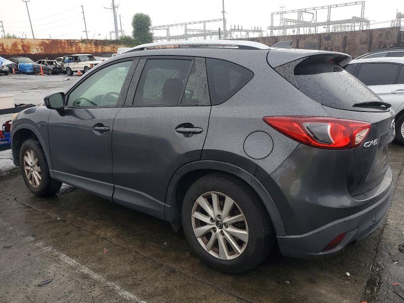 Photo 2 from auction – 2014 MAZDA CX-5 with VIN JM3KE2CY3E0328048