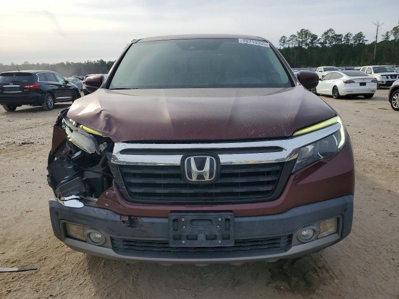 Photo 5 from auction – 2017 HONDA RIDGELINE with VIN 5FPYK3F76HB034029