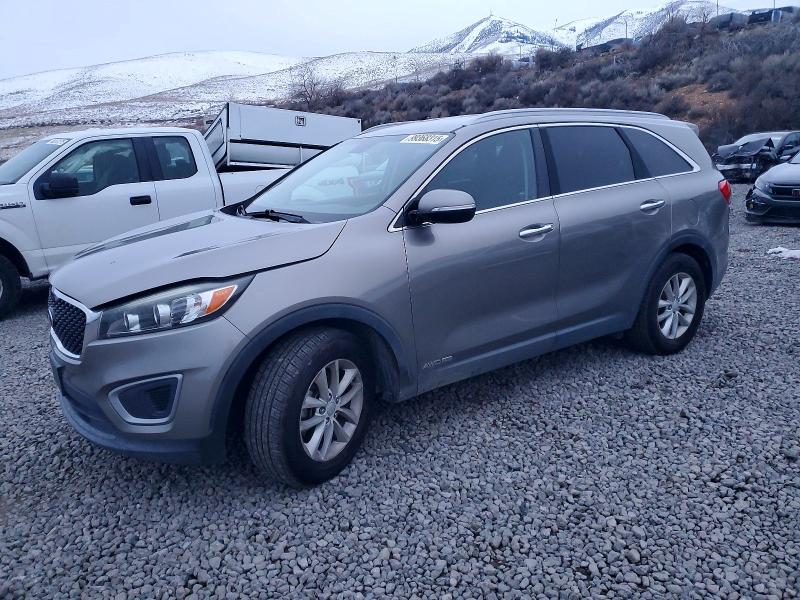 KIA SORENTO LX 2016 with VIN 5XYPGDA59GG131105 - Photo from auction