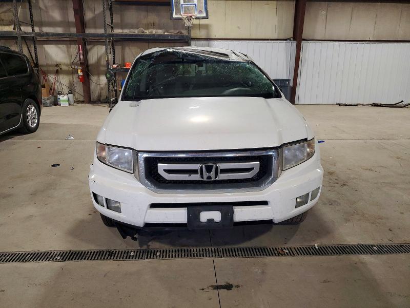 Photo 5 from auction – 2011 HONDA RIDGELINE with VIN 5FPYK1F57BB007075