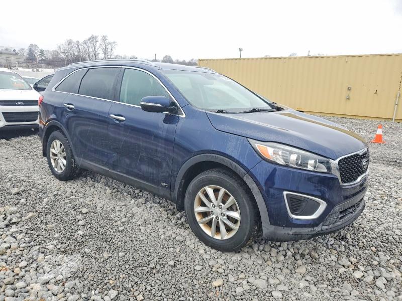 Photo 4 from auction – 2016 KIA SORENTO LX with VIN 5XYPGDA39GG039488