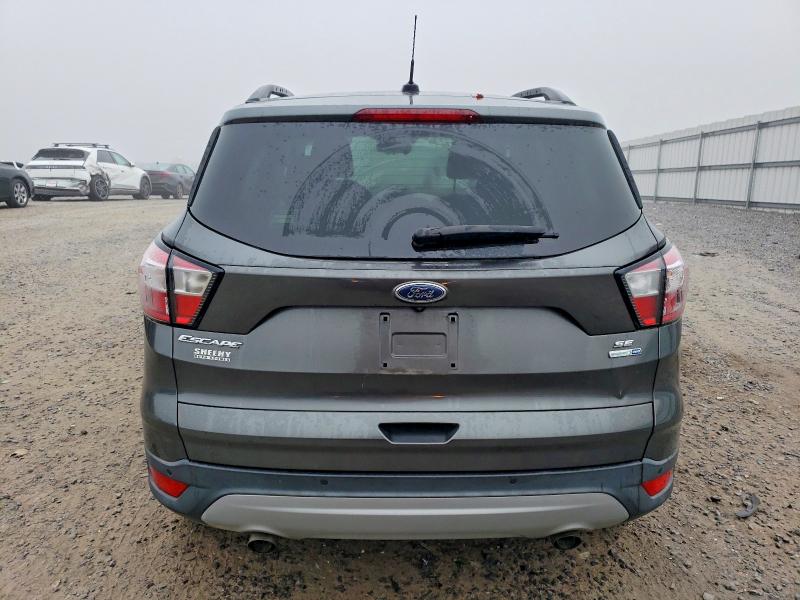Photo 6 from auction – 2017 FORD ESCAPE SE with VIN 1FMCU9GD6HUD35648