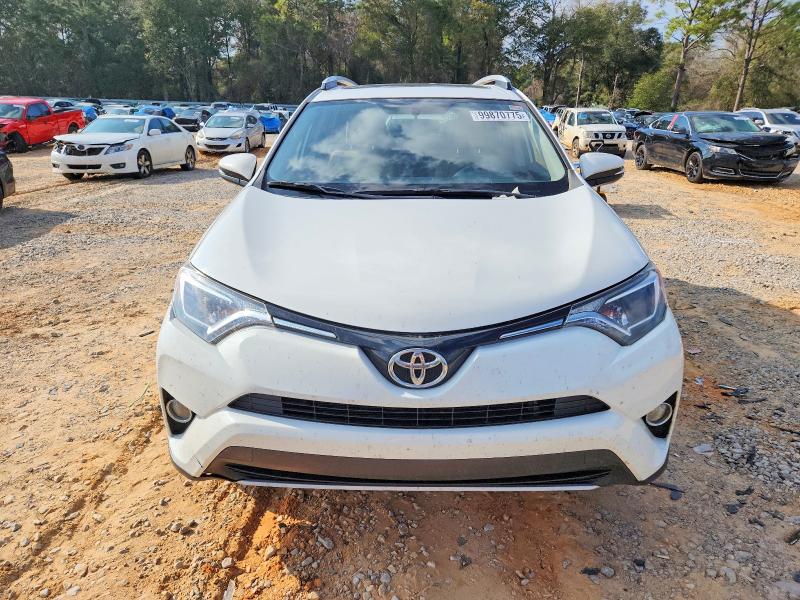 Photo 5 from auction – 2016 TOYOTA RAV4 XLE with VIN JTMWFREV4GJ097712