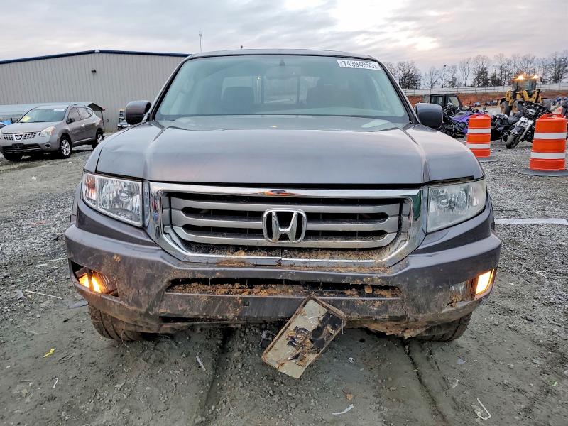 Photo 5 from auction – 2014 HONDA RIDGELINE with VIN 5FPYK1F55EB002994