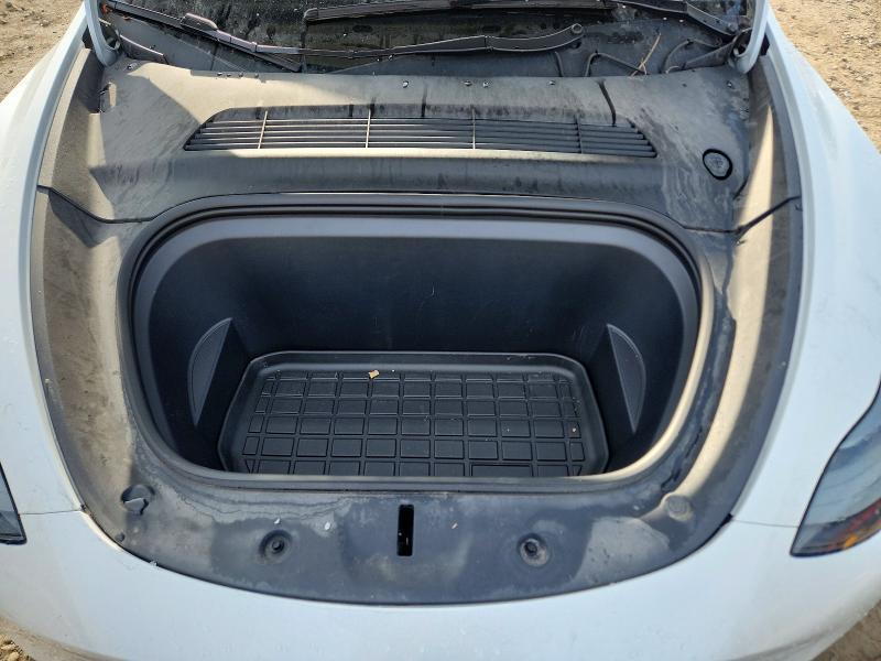 Photo 11 from auction – 2023 TESLA MODEL Y with VIN 7SAYGDEE0PF684525