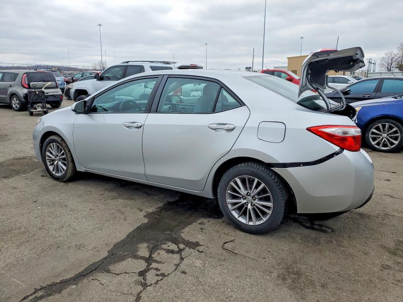 Photo 2 from auction – 2014 TOYOTA COROLLA L with VIN 5YFBURHE0EP066837