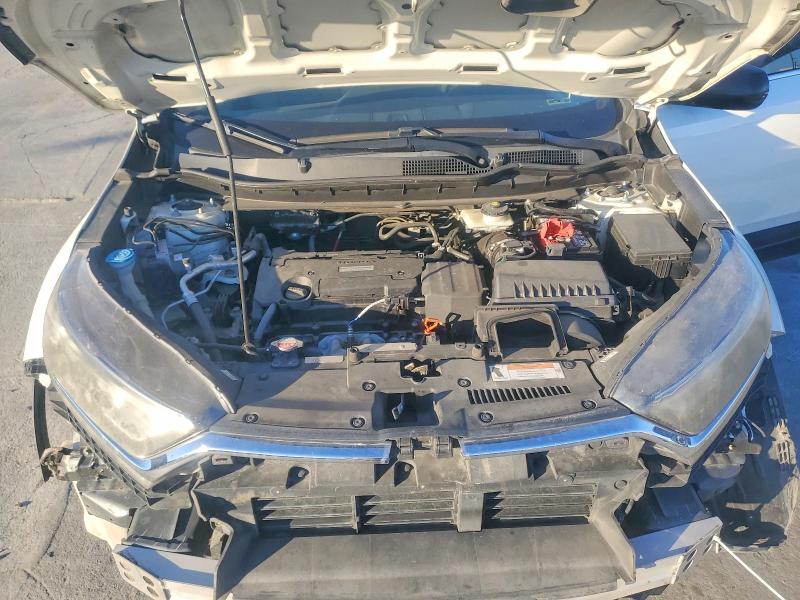 Photo 11 from auction – 2018 HONDA CR-V LX with VIN 2HKRW5H30JH415213