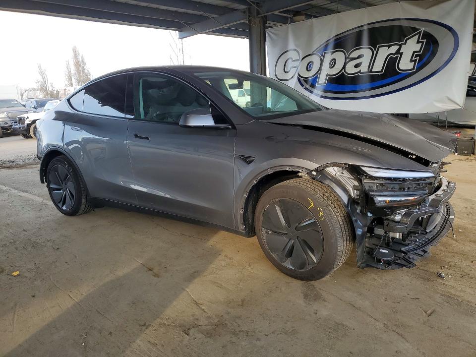 Photo 4 from auction – 2026 TESLA MODEL Y with VIN 7SAYGDED5TF381032
