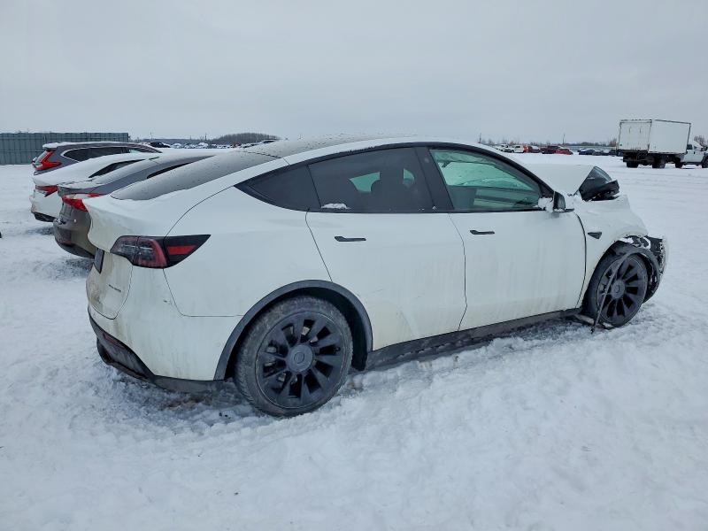 Photo 3 from auction – 2021 TESLA MODEL Y with VIN 5YJYGAEE9MF183284