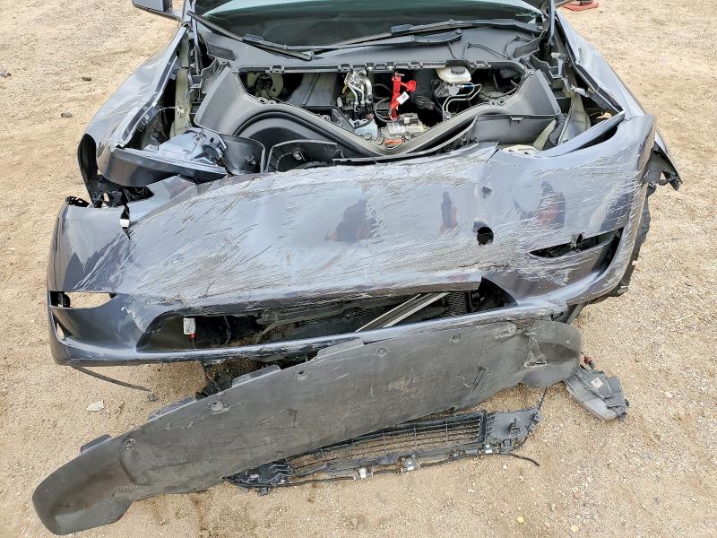 Photo 11 from auction – 2023 TESLA MODEL Y with VIN 7SAYGDEE6PF937041