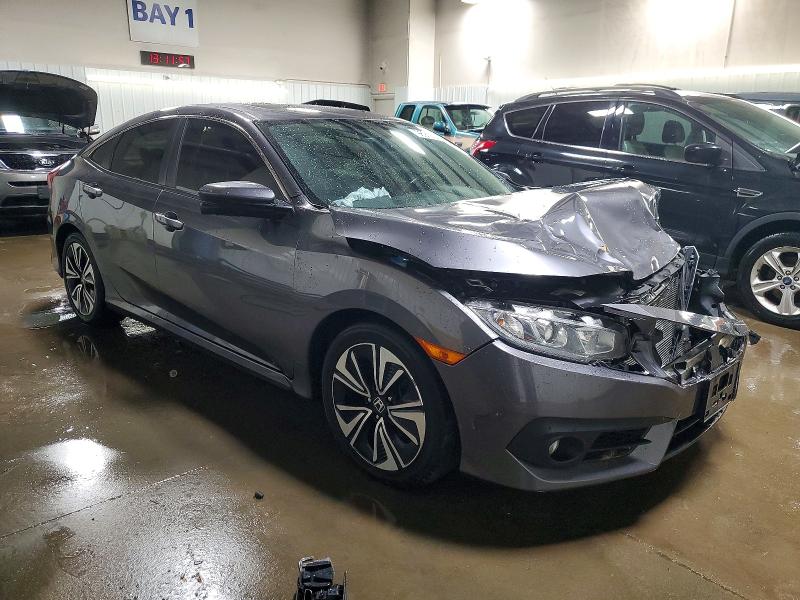 Photo 4 from auction – 2018 HONDA CIVIC EXL with VIN JHMFC1F7XJX029976