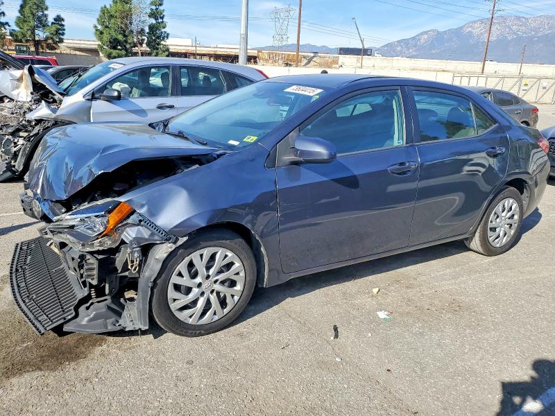 TOYOTA COROLLA L 2018 with VIN 5YFBURHE5JP752107 - Photo from auction