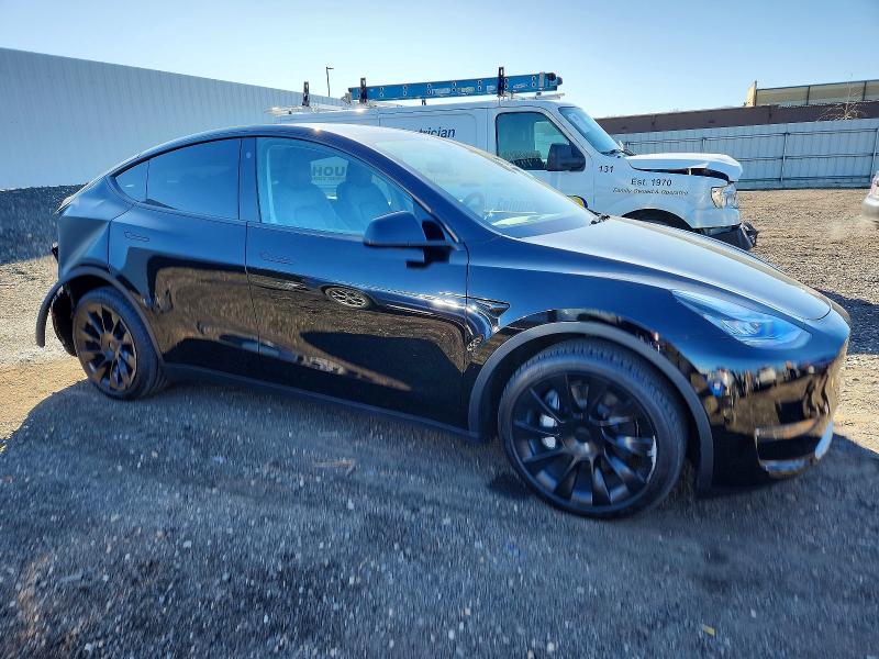 Photo 4 from auction – 2023 TESLA MODEL Y with VIN 7SAYGDEE1PA104387