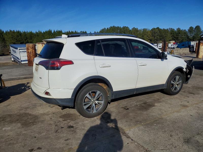 Photo 3 from auction – 2016 TOYOTA RAV4 XLE with VIN JTMWFREV2GJ060352
