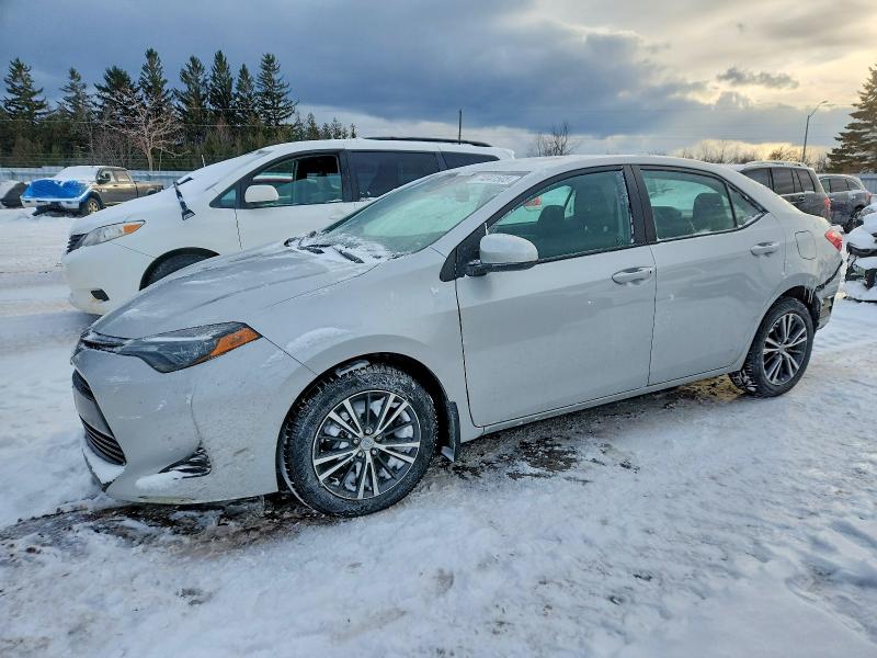 TOYOTA COROLLA L 2019 with VIN 2T1BURHE3KC233011 - Photo from auction