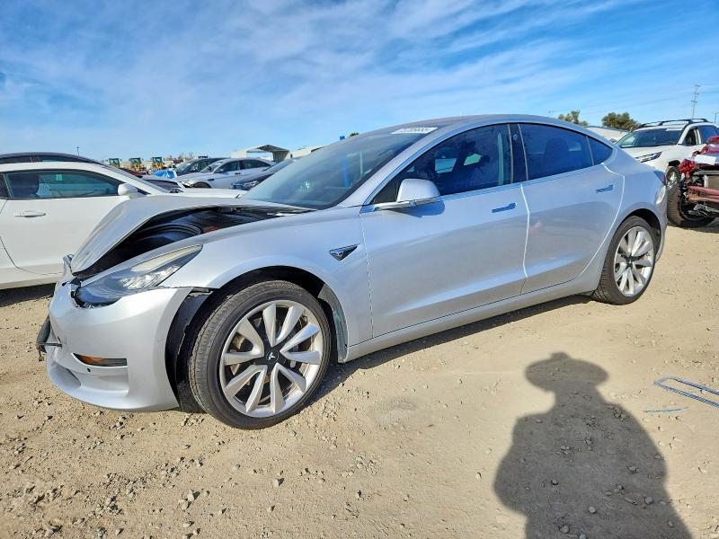 TESLA MODEL 3 2017 with VIN 5YJ3E1EA4HF001834 - Photo from auction