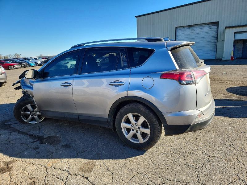 Photo 2 from auction – 2018 TOYOTA RAV4 LE with VIN JTMBFREV7JJ206833