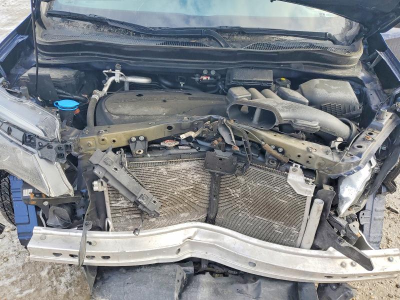 Photo 12 from auction – 2020 HONDA PASSPORT E with VIN 5FNYF8H58LB012371