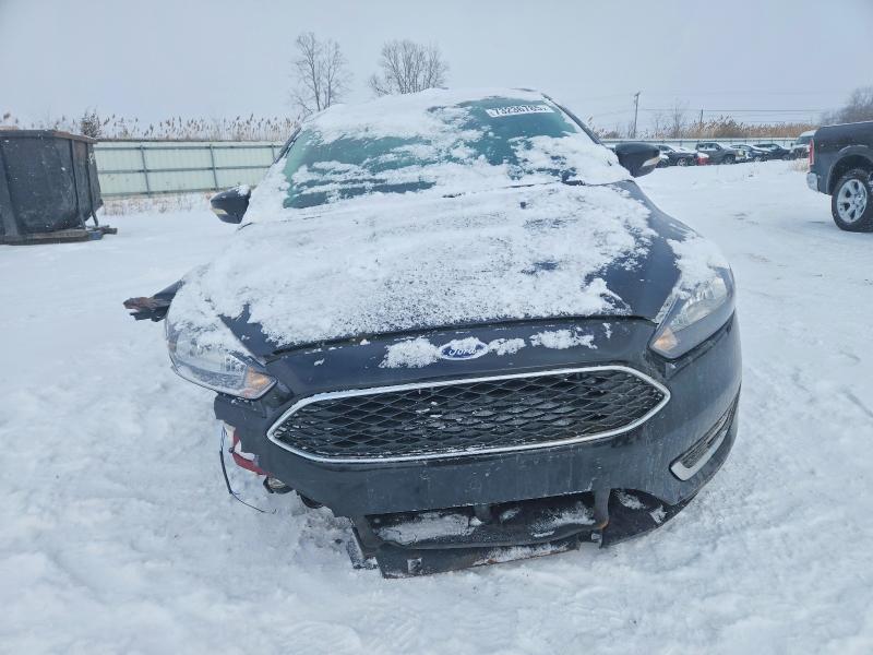 Photo 5 from auction – 2016 FORD FOCUS SE with VIN 1FADP3K22GL305530