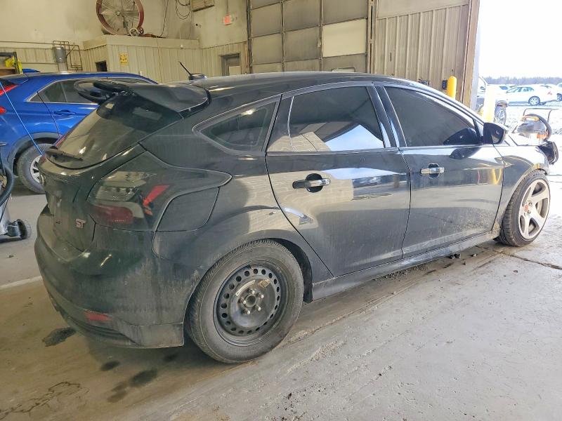 Photo 3 from auction – 2014 FORD FOCUS with VIN 1FADP3L97EL453925