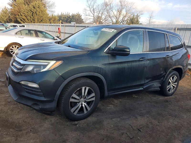 HONDA PILOT EXLN 2016 with VIN 5FNYF6H78GB074056 - Photo from auction