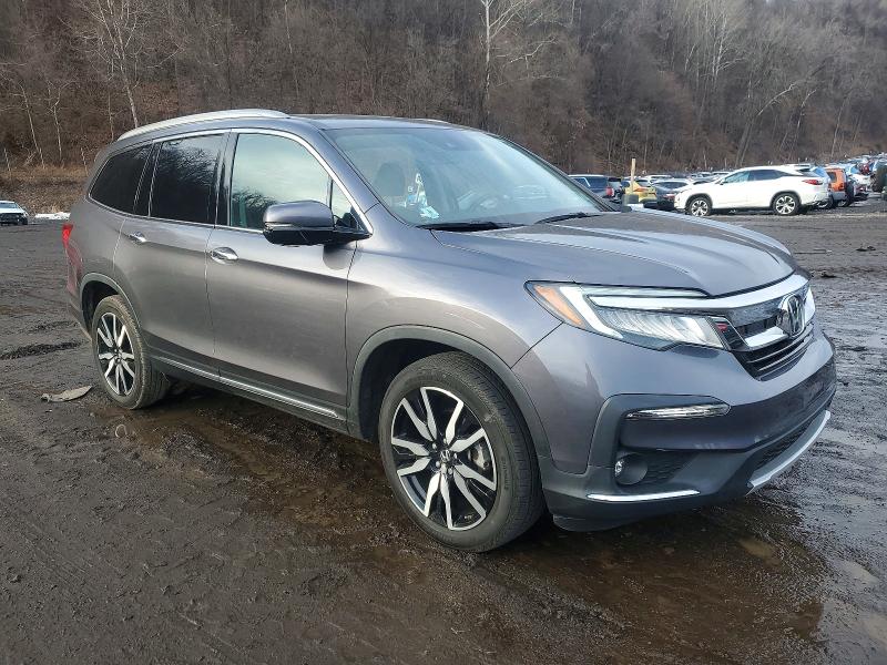 Photo 4 from auction – 2021 HONDA PILOT TOUR with VIN 5FNYF6H99MB070949