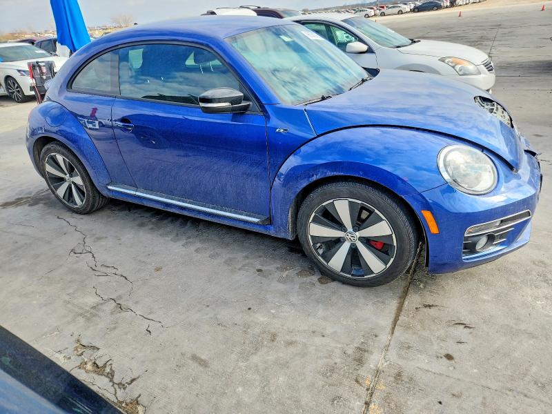 Photo 4 from auction – 2014 VOLKSWAGEN BEETLE TUR with VIN 3VWVT7AT4EM663166