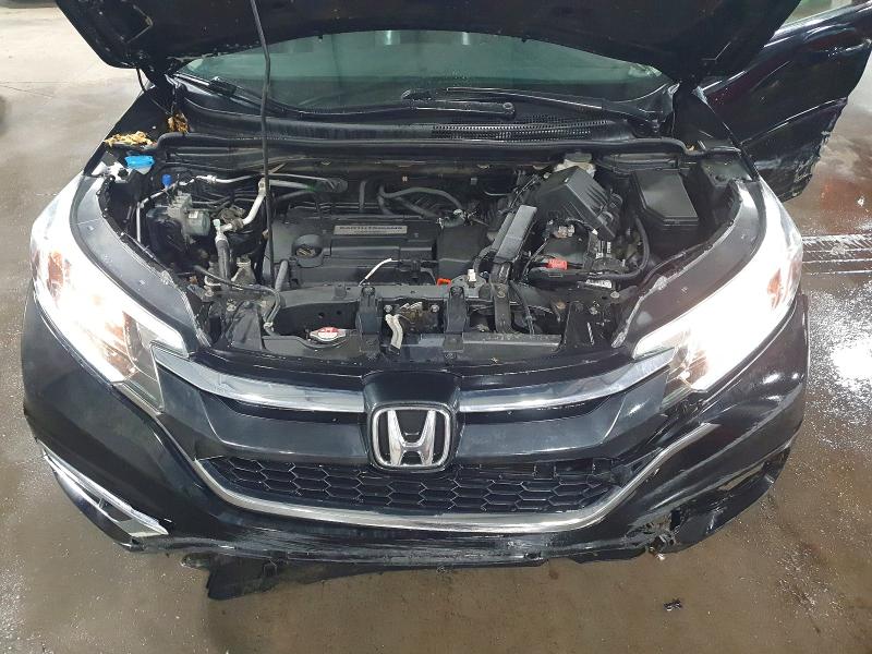 Photo 12 from auction – 2015 HONDA CR-V with VIN 2HKRM4H74FH613884