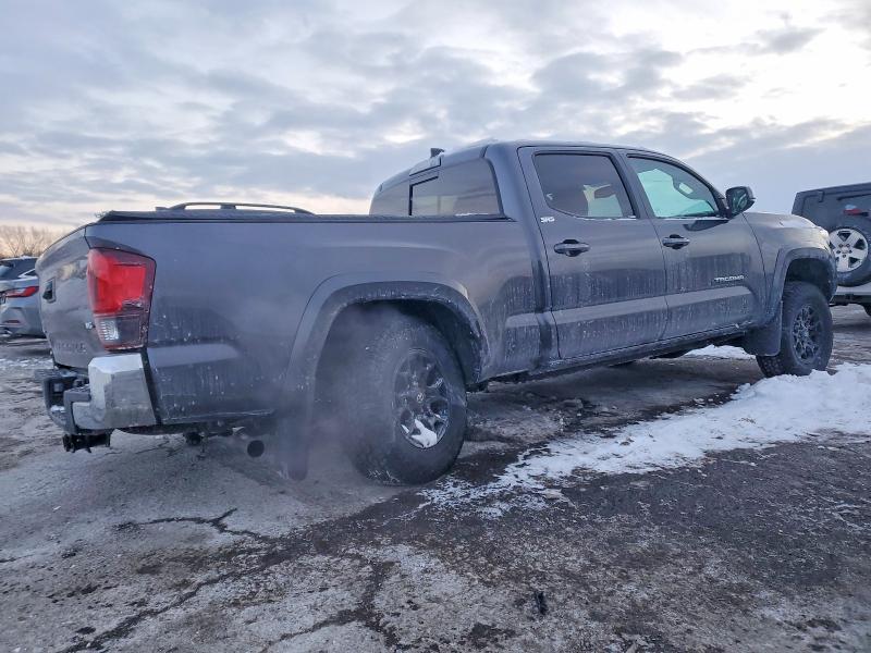 Photo 3 from auction – 2022 TOYOTA TACOMA with VIN 3TYDZ5BN1NT010199