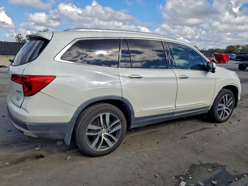 Photo 3 from auction – 2016 HONDA PILOT TOUR with VIN 5FNYF5H97GB022798