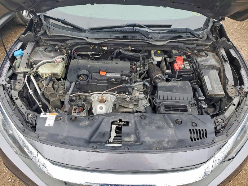 Photo 11 from auction – 2018 HONDA CIVIC with VIN 19XFC2F52JE031193